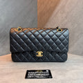 Chanel Classic Flap Medium, Black and Gold Lambskin, Structured Shape, 27 Series with Authenticity Card, Original Condition