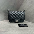 Chanel CF Square Flap Bag Black and Silver Lambskin Chain Bag 28 with Card. The bag has a structured shape and a clean interior.