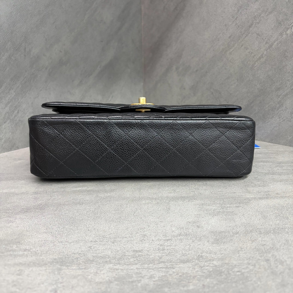 Chanel CF black gold lychee leather medium 26 open without card. The shape is three-dimensional and the interior is clean. Available in stock.