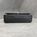 Chanel CF black gold lychee leather medium 26 open without card. The shape is three-dimensional and the interior is clean. Available in stock.