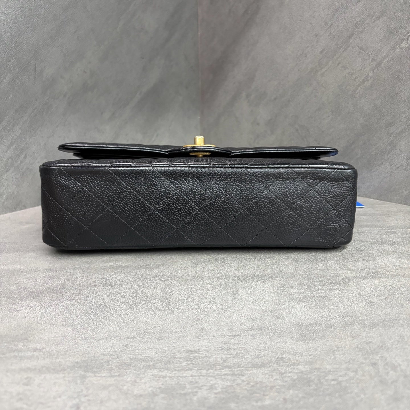 Chanel CF black gold lychee leather medium 26 open without card. The shape is three-dimensional and the interior is clean. Available in stock.