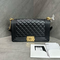 Chanel Le Boy Medium Black Gold Caviar Leather Chain Bag 28 with Card and Receipt. The bag has a structured shape and a clean interior.