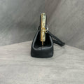 Fendi First handbag Dinner bag is made of soft black Napa leather