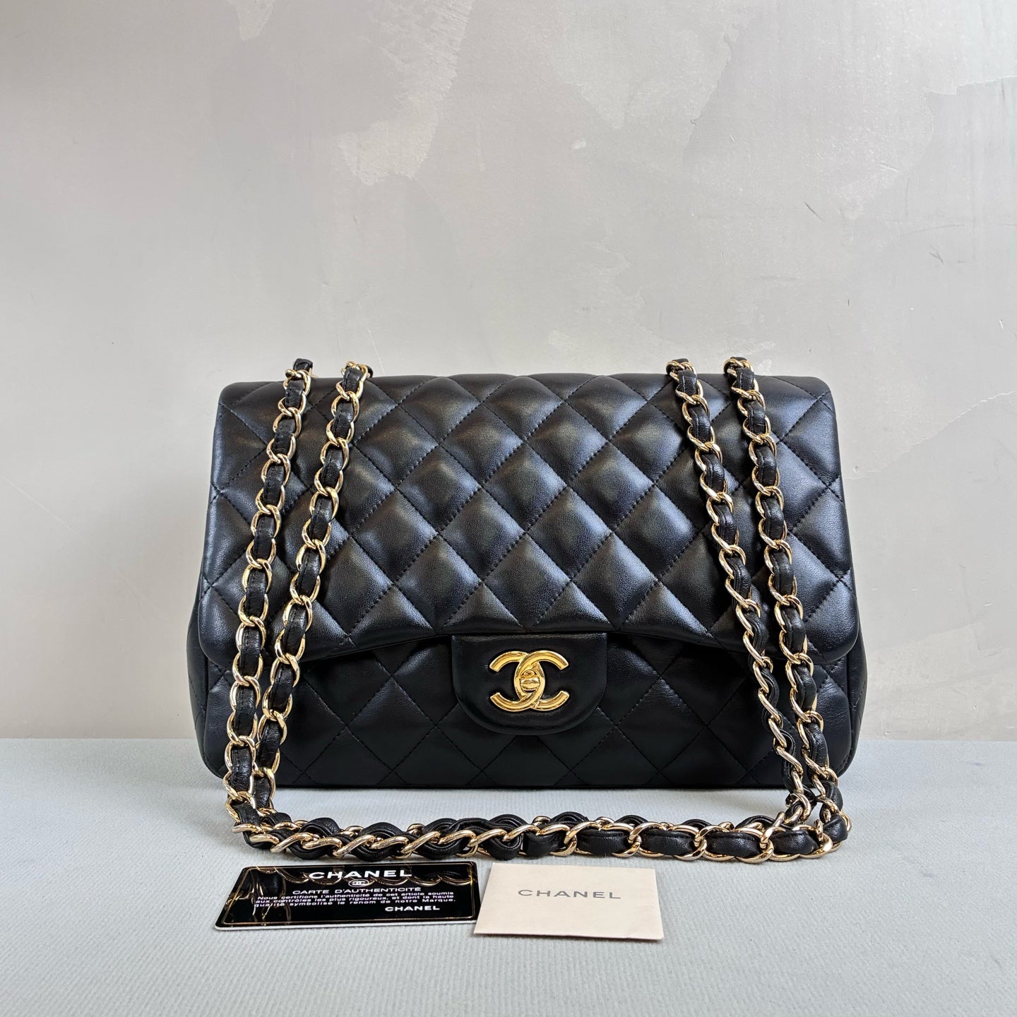 Chanel 14-inch 99% new CF medium size black and gold quilted lambskin dimensions 30*19.