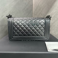 CHANEL, medium-sized, in excellent condition, So Black Leboy series, black-buckled quilted leather chain shoulder crossbody handbag, 23