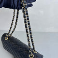 CHANEL Classic Medium Litchi Leather Durable Anti-Scratch Handbag with Iconic Gold Double C Twist Lock in Black and Gold, 14-inch Shoulder Bag