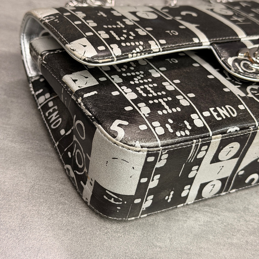 Chanel CF Medium Black and White Newspaper Graffiti Bag, three-dimensional shape, clean interior.