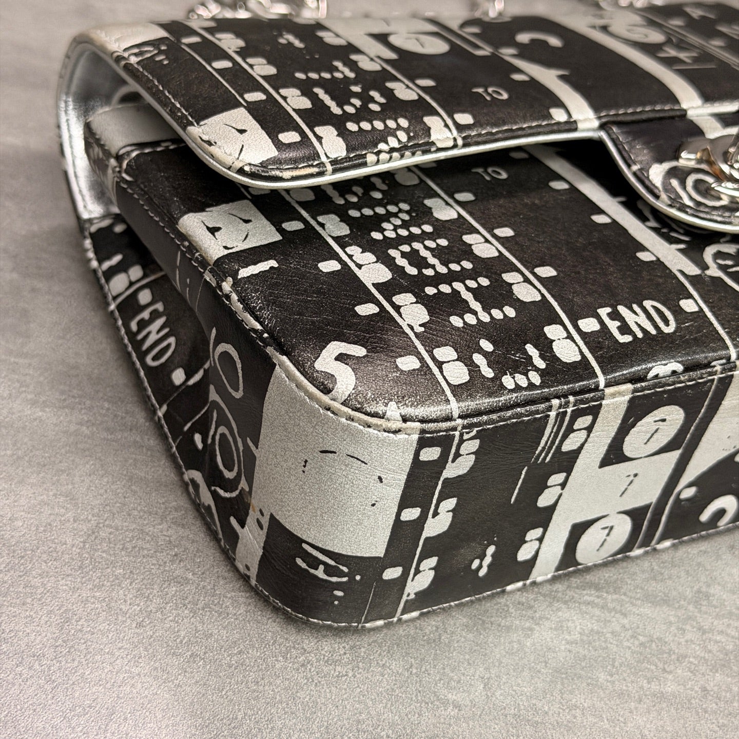 Chanel CF Medium Black and White Newspaper Graffiti Bag, three-dimensional shape, clean interior.