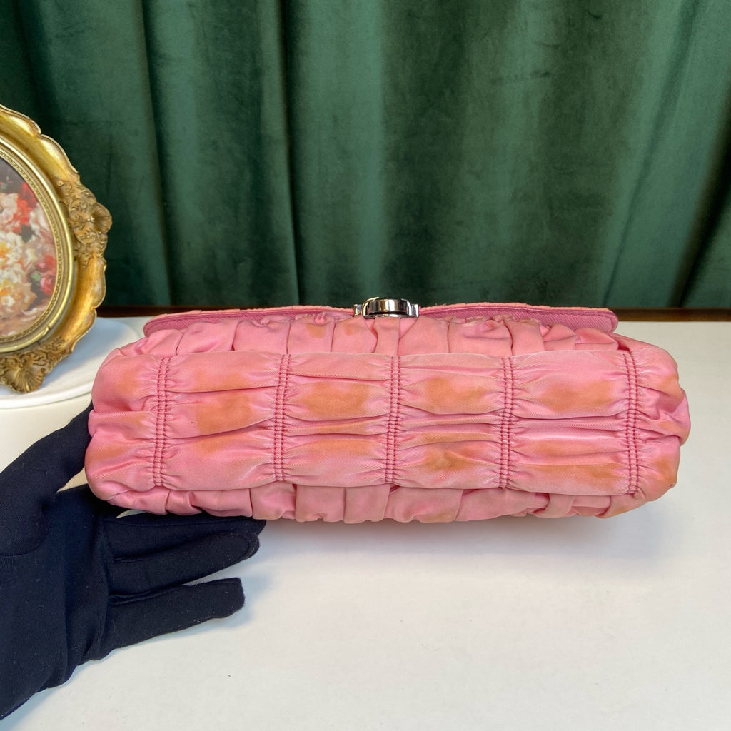 Prada Pink Pleated Chain Bag! Pink pleated parachute material shoulder underarm crossbody chain bag, paired with a silver lock. Size: 23*15.