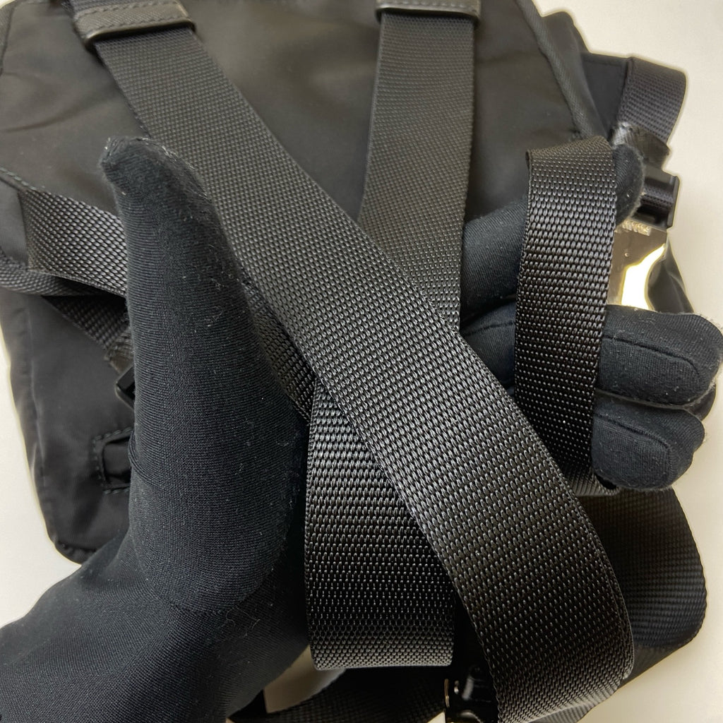 Prada Black and Silver Nylon Multifunctional Backpack Show Style, Backpack in 99% New Condition Dimensions: 22×17 Black and Silver Nylon Material