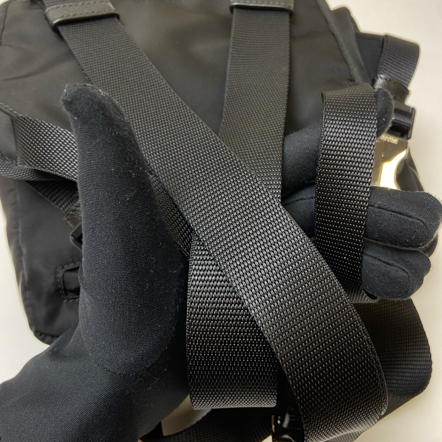 Prada Black and Silver Nylon Multifunctional Backpack Show Style, Backpack in 99% New Condition Dimensions: 22×17 Black and Silver Nylon Material