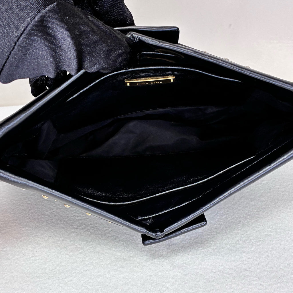 Miu Miu 95% new black studded clutch with gold stud embellishments, size: 18*14*5cm.