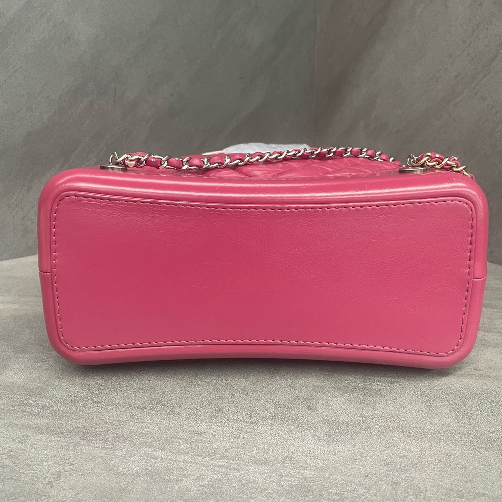 CHANEL Raspberry Pink V-Wave Mini Flap Bag with Crossbody Chain, 26 openings with card, in stock at a great price.