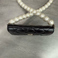 Chanel Chanel large pearl chain mini woc 31 open strap card in original condition