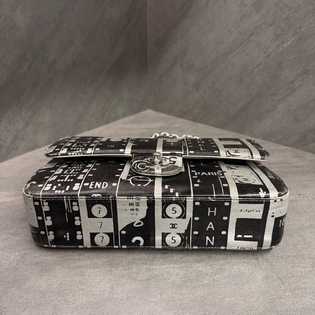 Chanel CF Medium Black and White Newspaper Graffiti Bag, three-dimensional shape, clean interior.