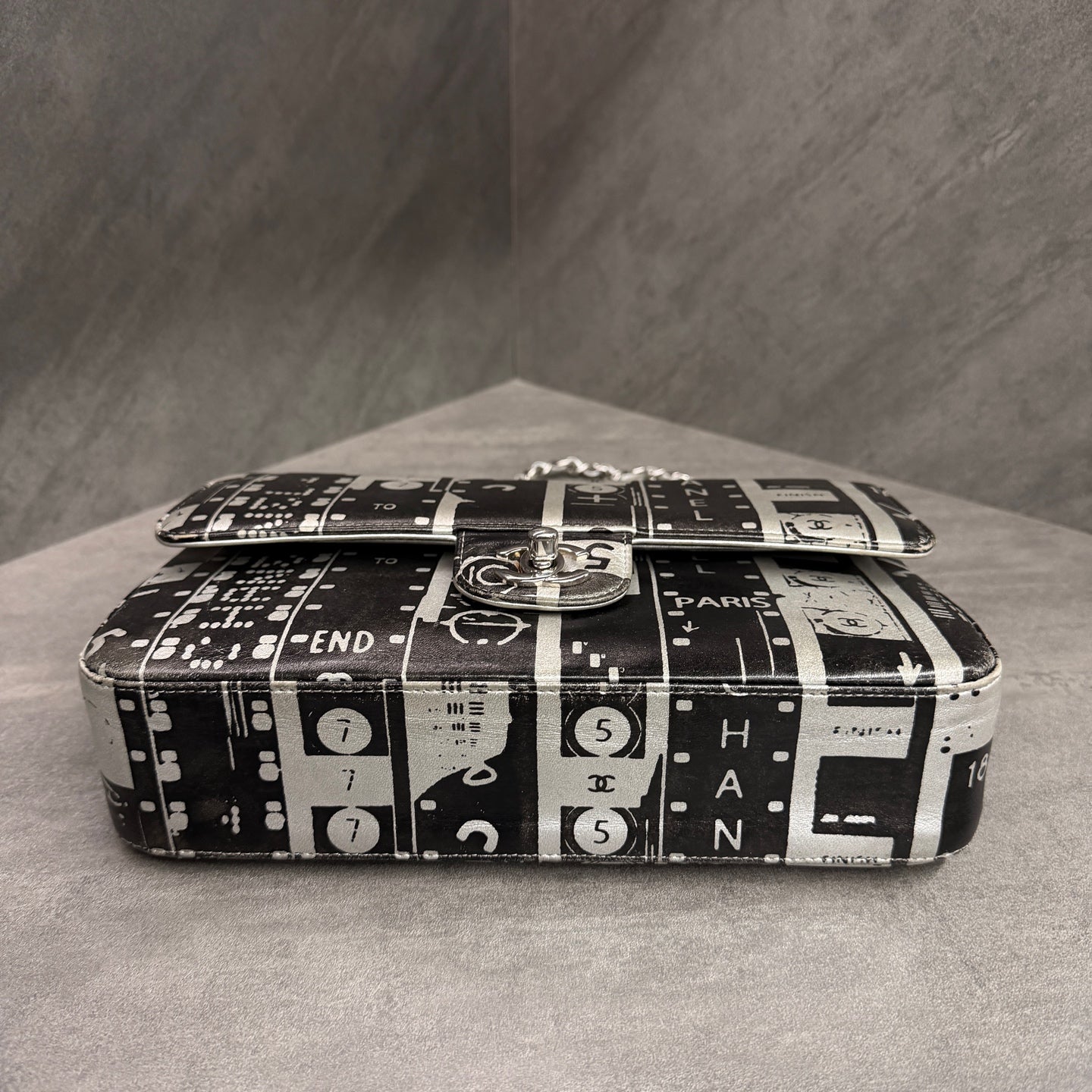 Chanel CF Medium Black and White Newspaper Graffiti Bag, three-dimensional shape, clean interior.