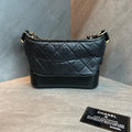 Chanel Black and Gold Small Gabrielle Bag, 25 serial with authenticity card, structured silhouette, clean interior