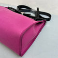 Hermès Herbag 31 in a purple and black color combination, made of canvas and leather, in 98% new condition. Dimensions: 31*25 cm.
