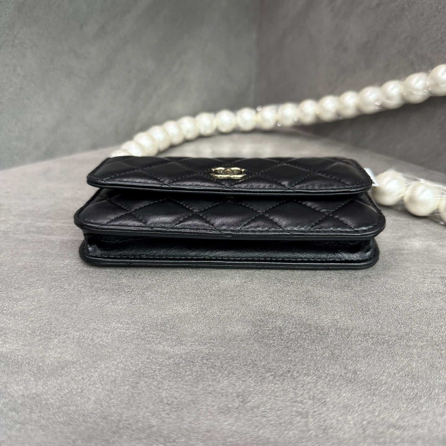 Chanel Chanel large pearl chain mini woc 31 open strap card in original condition