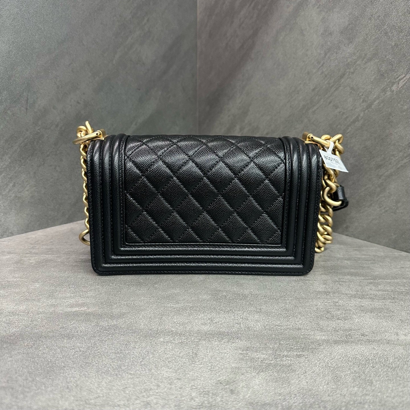 Chanel Le Boy Small Black Gold Lambskin Chain Bag 26 opening, structured shape, clean interior.