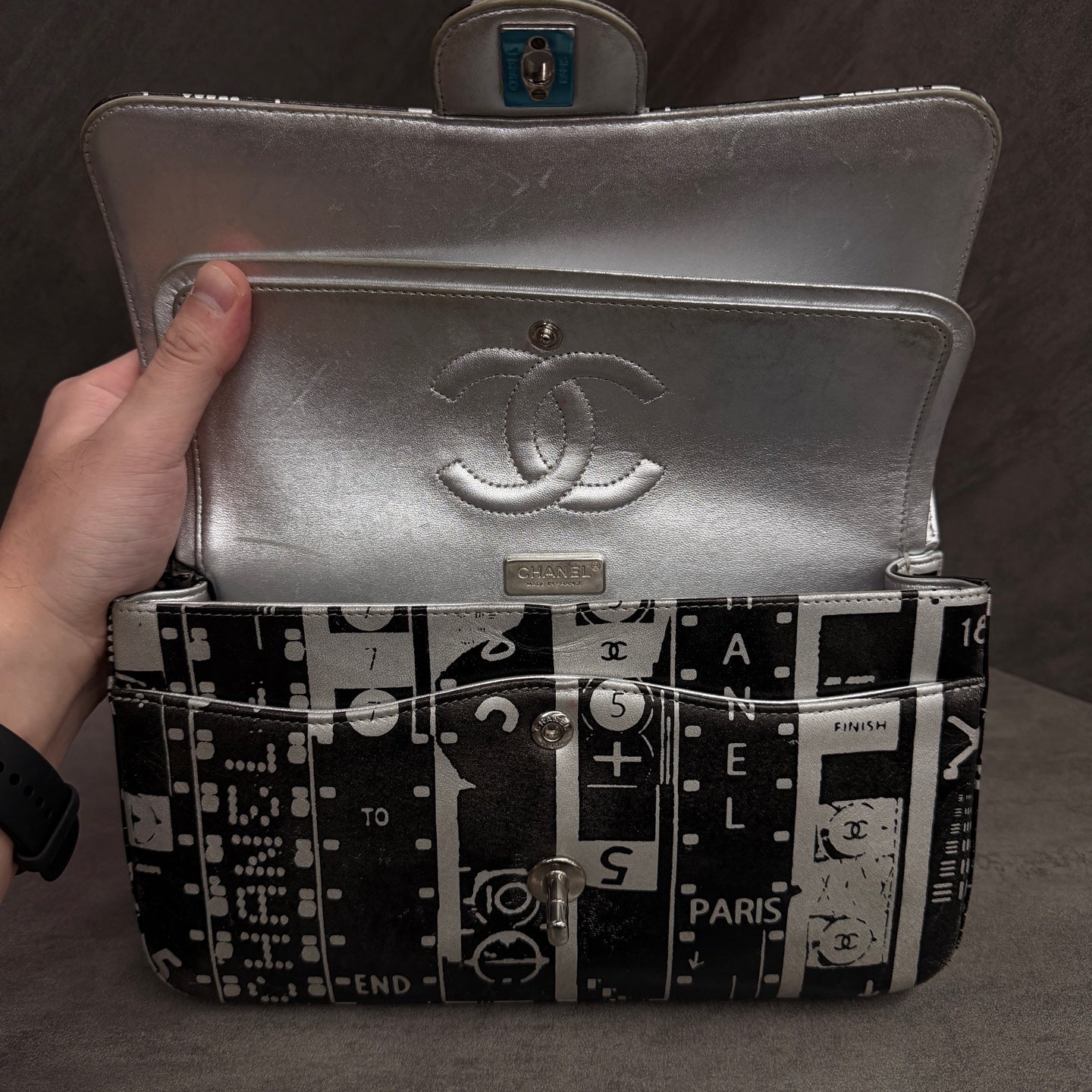 Chanel CF Medium Black and White Newspaper Graffiti Bag, three-dimensional shape, clean interior.