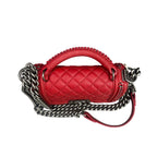 Chanel Red Le Boy Small Handbag, Palace Edition, 23-Opening with Card and Ticket. The bag shape is three-dimensional and full, with no wear on the corners.