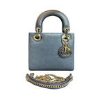 99% new Dior Lady Dior bag, three compartments, gray gold in ostrich leather, structured shape, clean interior, no wear on corners, 2021 code, original condition.