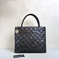 Chanel Hilton Black Tote Bag, Pebbled Calfskin, Classic Double C Embossing, Hand Carry Style, Large Capacity, Practical for Commuting