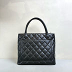 Chanel Hilton Black Tote Bag, Pebbled Calfskin, Classic Double C Embossing, Hand Carry Style, Large Capacity, Practical for Commuting