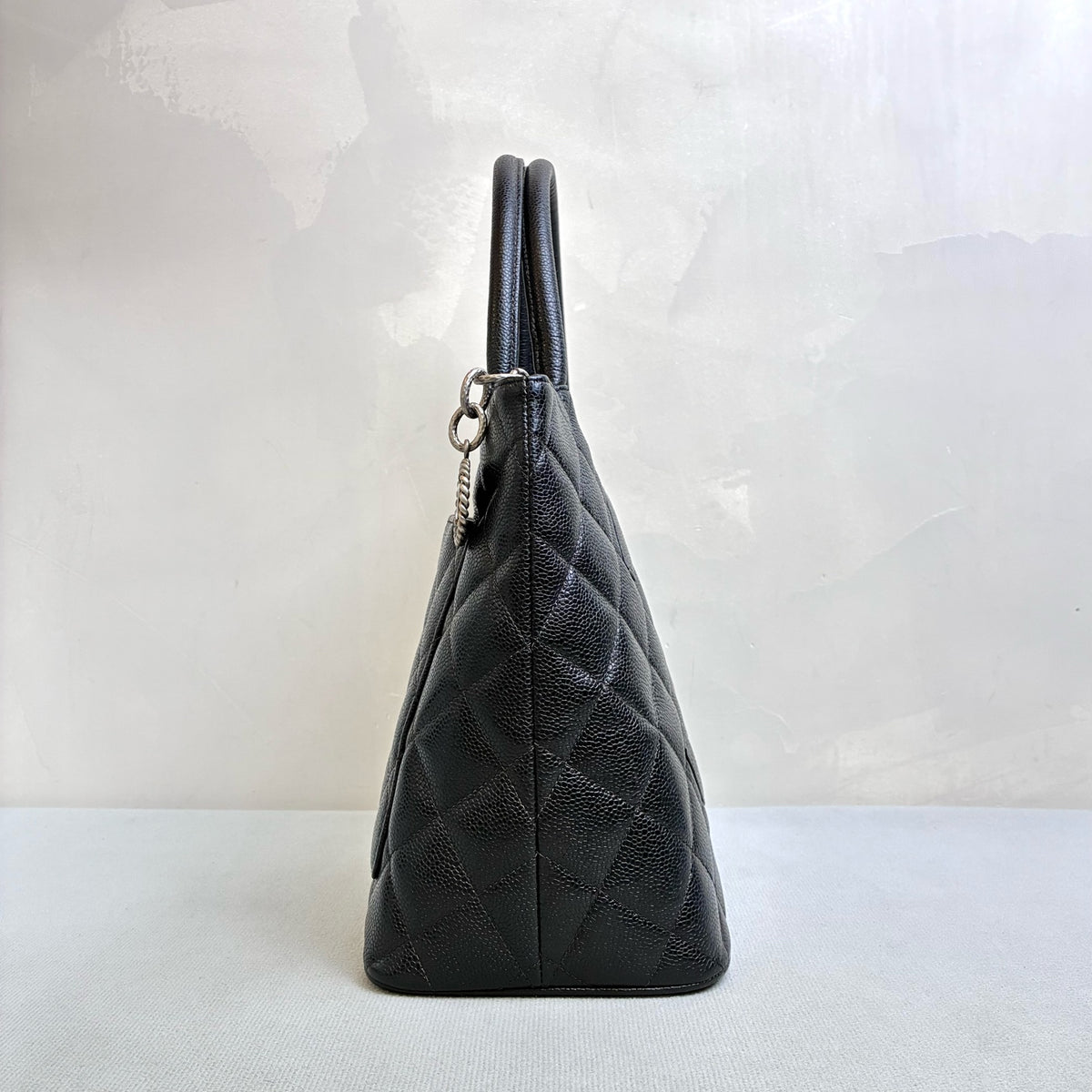 Chanel Hilton Black Tote Bag, Pebbled Calfskin, Classic Double C Embossing, Hand Carry Style, Large Capacity, Practical for Commuting