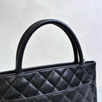 Chanel Hilton Black Tote Bag, Pebbled Calfskin, Classic Double C Embossing, Hand Carry Style, Large Capacity, Practical for Commuting