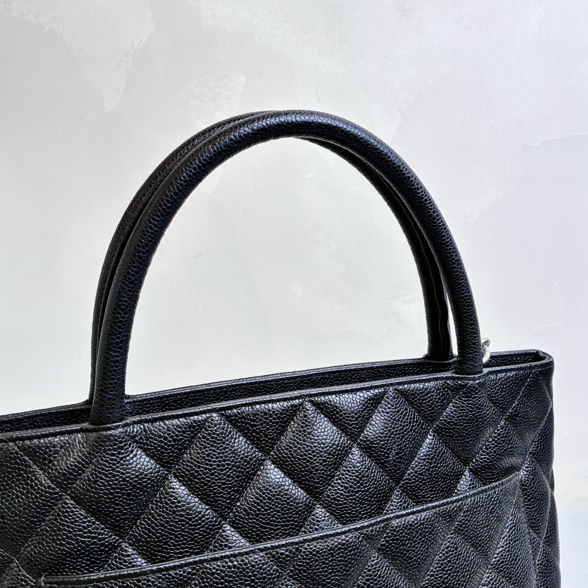 Chanel Hilton Black Tote Bag, Pebbled Calfskin, Classic Double C Embossing, Hand Carry Style, Large Capacity, Practical for Commuting