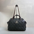 Chanel Black Quilted Chain Shoulder Bag, Bowling Bag Shape, Iridescent Calfskin and Oiled Leather, Classic Style