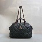Chanel Black Quilted Chain Shoulder Bag, Bowling Bag Shape, Iridescent Calfskin and Oiled Leather, Classic Style