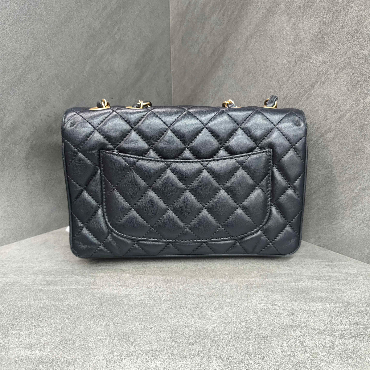 CHANEL Black Gold Lambskin Accordion Flap Bag