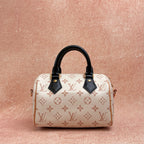 LV Louis Vuitton Speedy 20 Dune Pillow Bag, chip version classic monogram, off-white with black handles, gold hardware