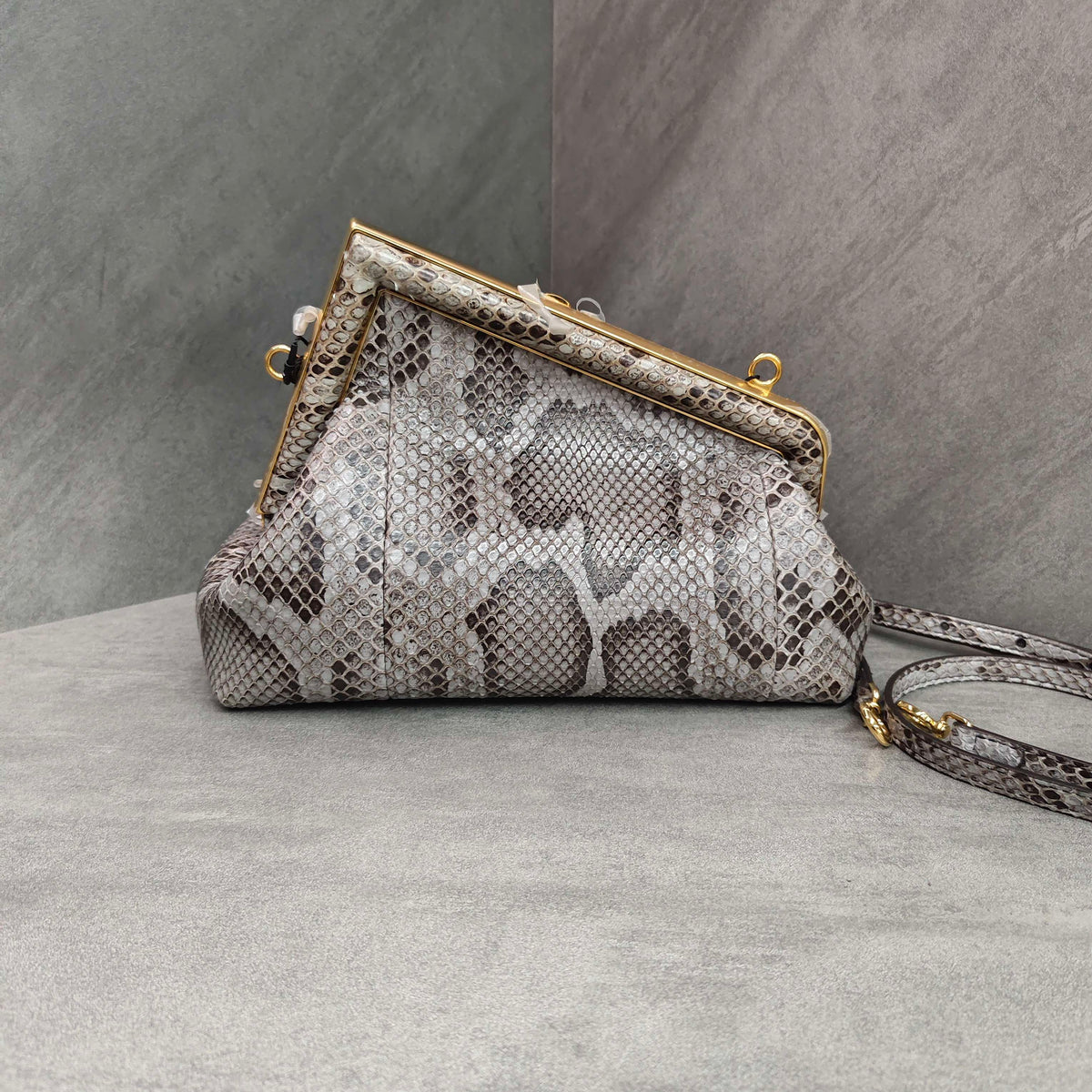 Fendi First Clutch Bag in Python Leather with Classic Monogram