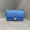 CHANEL Blue Chevron Lambskin with Gold Hardware
