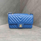 CHANEL Blue Chevron Lambskin with Gold Hardware