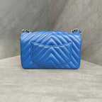 CHANEL Blue Chevron Lambskin with Gold Hardware