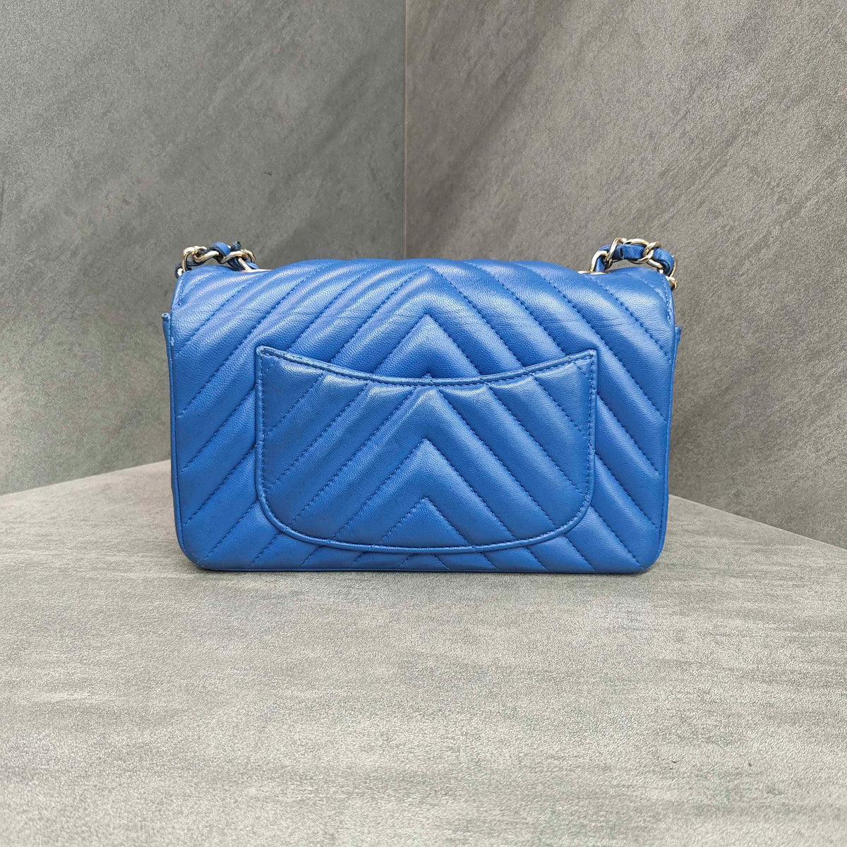 CHANEL Blue Chevron Lambskin with Gold Hardware