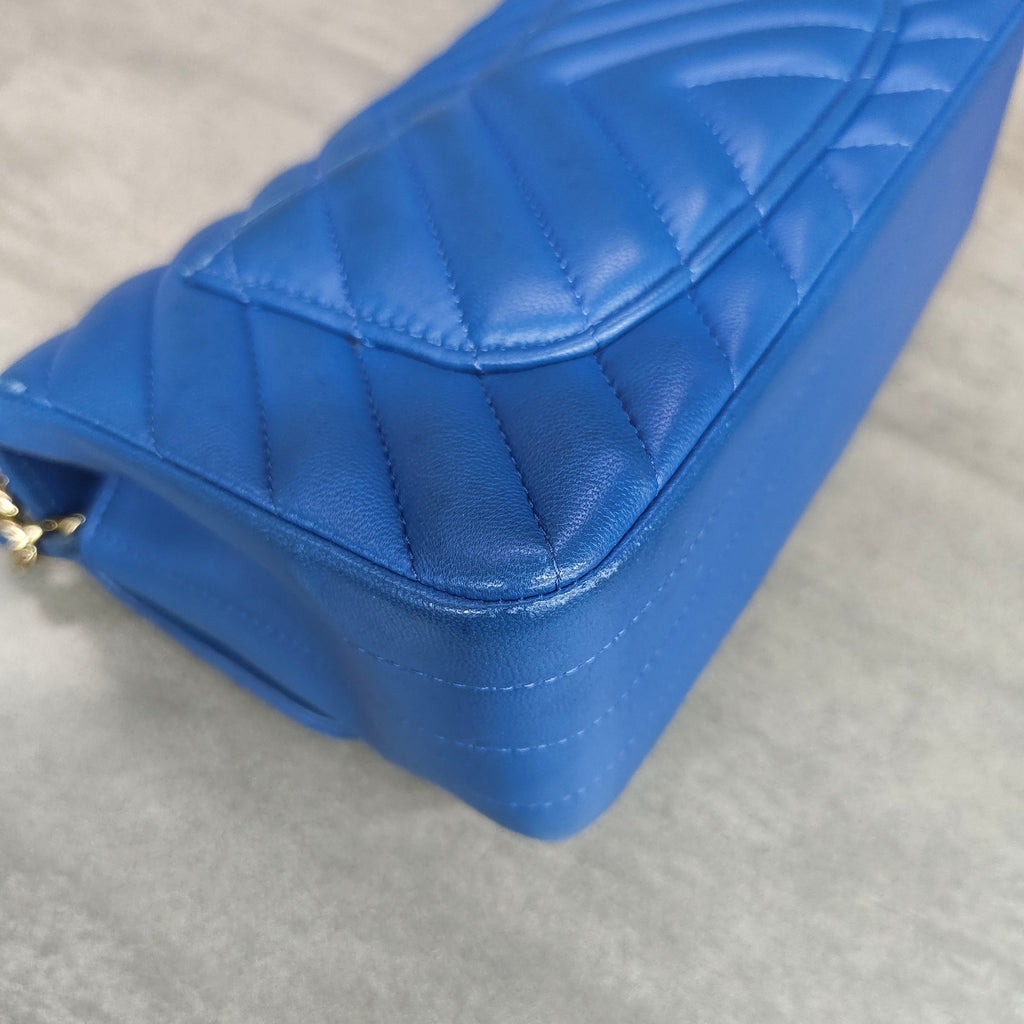 CHANEL Blue Chevron Lambskin with Gold Hardware