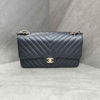 CHANEL Classic Flap Bag Black Chevron Caviar Leather Gold Hardware