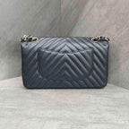 CHANEL Classic Flap Bag Black Chevron Caviar Leather Gold Hardware