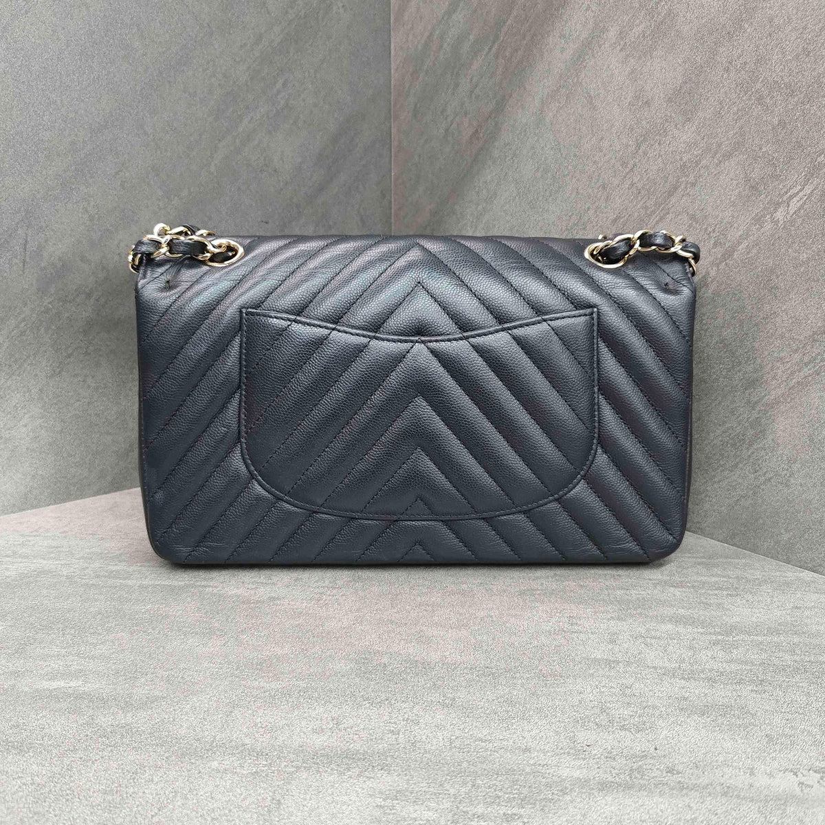 CHANEL Classic Flap Bag Black Chevron Caviar Leather Gold Hardware