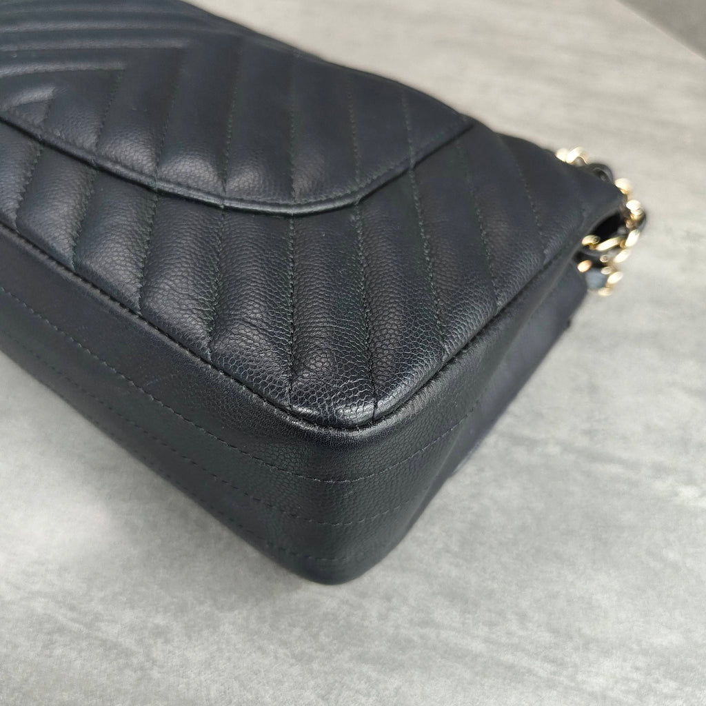 CHANEL Classic Flap Bag Black Chevron Caviar Leather Gold Hardware
