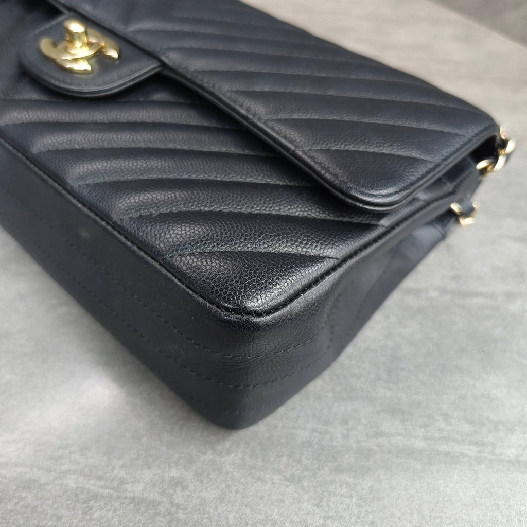 CHANEL Classic Flap Bag Black Chevron Caviar Leather Gold Hardware