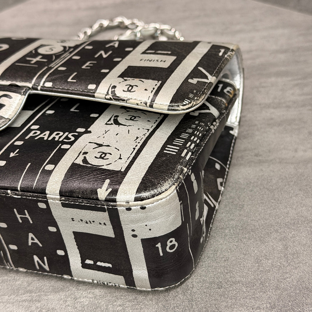 Chanel CF Medium Black and White Newspaper Graffiti Bag, three-dimensional shape, clean interior.