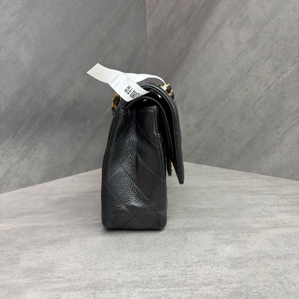 Chanel CF black gold lychee leather medium 26 open without card. The shape is three-dimensional and the interior is clean. Available in stock.
