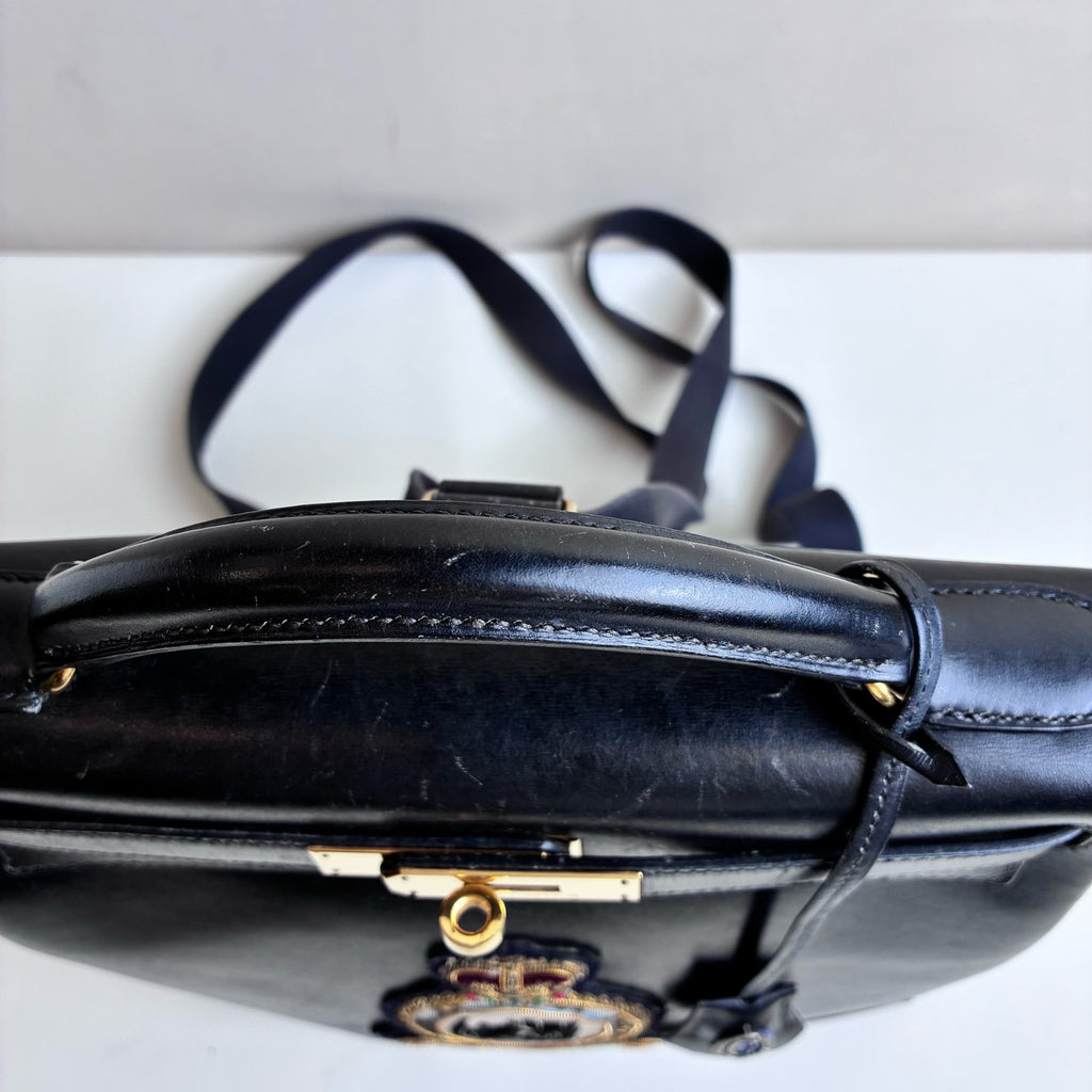 Hermes Kelly Ado Black and Gold Emblem Special Edition Crocodile Pendant